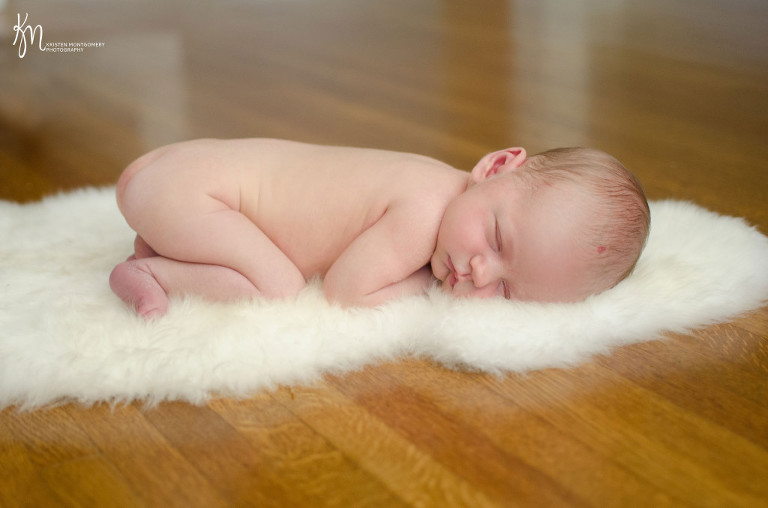 Newborn and Big Sibling Photos, Black and White Natural Light Newborn Photo, Newborn on Sheepskin Rug